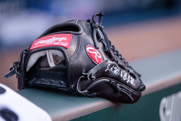 Jun 28, 2023; Kansas City, Missouri, USA; Glove sits on the dugout wall prior to the game between the Cleveland Guardians and the Kansas City Royals at Kauffman Stadium. Mandatory Credit: William Purnell-USA TODAY Sports